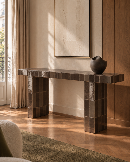 Almica No. 04 Console Table in polished chocolate porcelain tile in a warm architectural interior