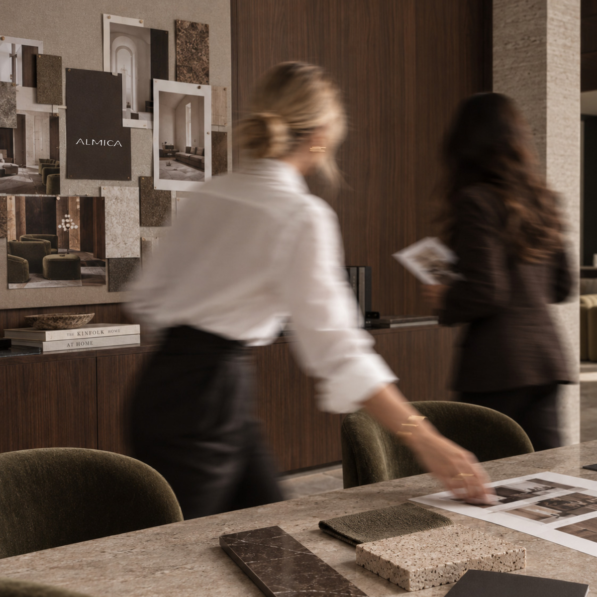 Material boards, interior references and finishes in a design studio.